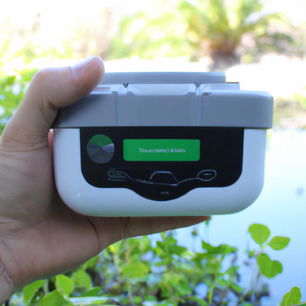 Person holding smart irrigation controller