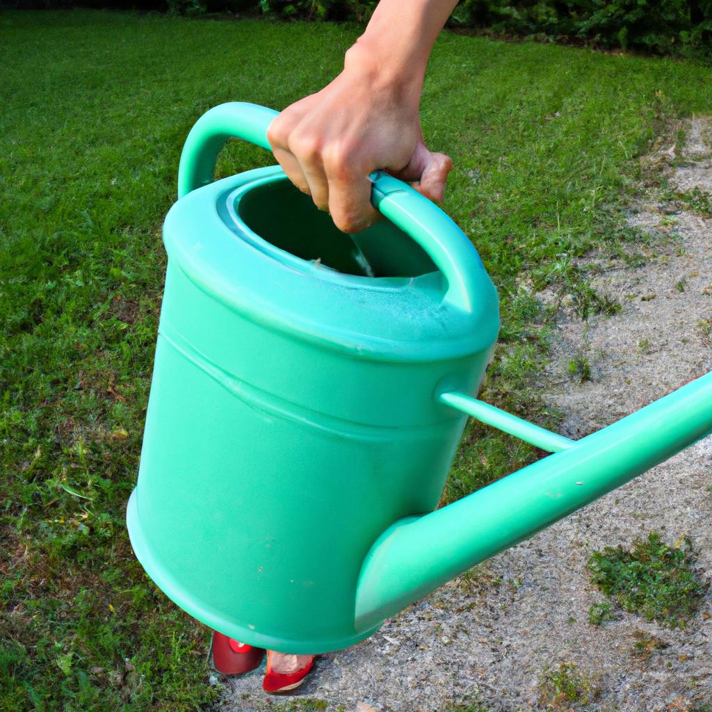 Person holding watering can outdoors